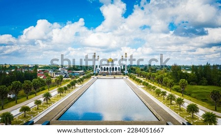 Hat Yai central mosque(masjid) with a beautiful blue sky cloud, Songkhla, Thailand. Beautiful mosque, Landscape.