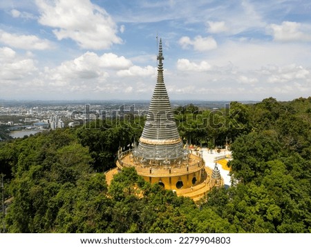 Hat Yai, Thailand - February 10, 2023: Wat Stainless Steel is a contemporary chedi Thai temple built from stainless steel and is located in Hat Yai, Thailand.