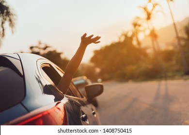 Hatchback Car travel driving road trip of woman summer vacation in blue car at sunset,Girls happy traveling enjoy holidays and relaxation with friends together get the atmosphere and go to destination - Shutterstock ID 1408750415