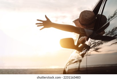 Hatchback Car travel driving road trip of woman summer vacation in car at sunset,Girls happy traveling enjoy holidays and relaxation with friends together get the atmosphere and go to destination - Powered by Shutterstock