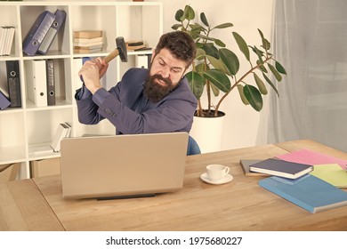 Hate My Job. Dealing With Error. Overworked Man Crush Laptop With Hammer. Frustrated Computer User. Businessman Express Anger. Ready To Smash. Office Life Makes Him Crazy. Slow Internet Connection