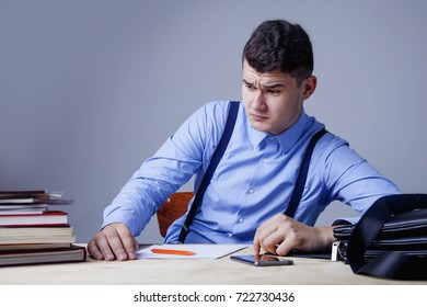 I Hate My Office Work. Young Businessman Working In Office. Low Wages, Overtime Working Hours, Lack Of Career Prospects Concept. (Body Language, Gestures, Psychology)