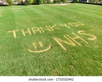 Hatfield, England - April 19th 2020: NHS Tribute Saying 'Thank You NHS' Mowed Into Playing Field