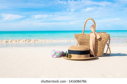 Hats and glasses placed on the beach and sea have a holiday summer relaxing and travel bright sky koh lipe thailand - Powered by Shutterstock