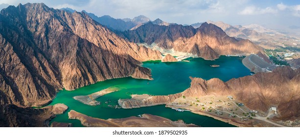 Hatta Dam Lake in mountains enclave region of Dubai, United Arab Emirates aerial panoramic view