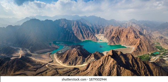 Hatta Dam Lake in mountains enclave region of Dubai, United Arab Emirates aerial panoramic view