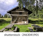 Hattuvaara, Ilomantsi, Finland, August 20 2023. During the weekend trip, we took a short walk in Hattuvaara, Ilomantsi. We walked around the tsasouna, the cemetery and the Makkola museum farm. Old hut