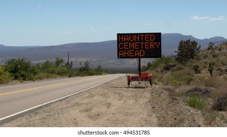 Haunted Cemetary Ahead - Electronic Road Sign