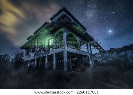 A haunted house.. long exposure night shot, plus digital art 
