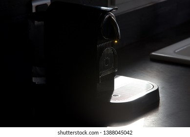 Hauts-de-France/France-March 19 2019: A Sun-struck Bead Of Coffee On The Nozzle Of A Magimix Nesspresso Citiz & Milk Coffee Machine