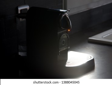 Hauts-de-France/France-March 19 2019: A Sun-struck Bead Of Coffee On The Nozzle Of A Magimix Nesspresso Citiz & Milk Coffee Machine