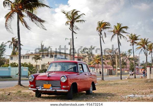 HAVANA - 25 MARCH: Vintage car in Cuba, Havana,\
March 25, 2007. October 2011, Cuban people finally got the right to\
trade on buying and selling cars. Ban on trade with cars was\
introduced in 1959.