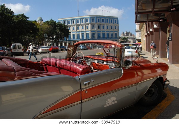 HAVANA - CIRCA FEBRUARY\
2009: One of the many old American cars is seen on a city street in\
Havana, circa February 2009. Owning one of these cars is an asset\
for Cubans.