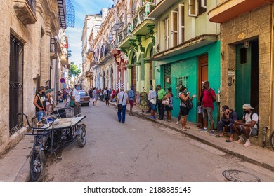 HAVANA CITY, CUBA - JANUARY 2: Line Of People Queue Up For Buying Food At A Local Shop On The Street On January 2, 2021 In Havana