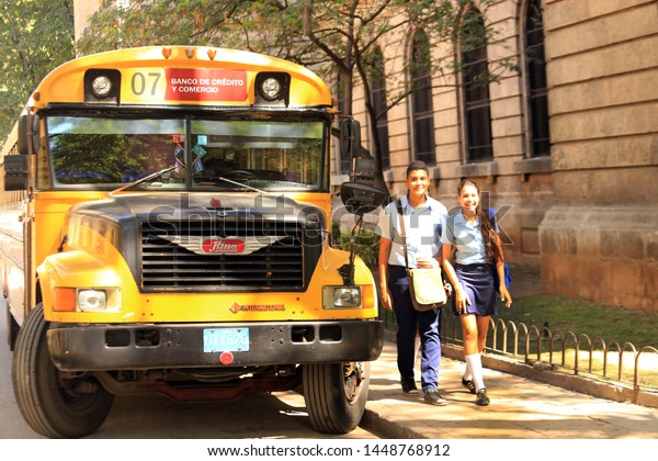 HAVANA - CUBA / 03.09.2015:\
Yellow Ford school bus parked at roadside, Havana, La Habana Vieja,\
Cuba