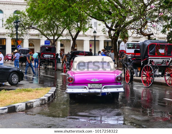 Havana, Cuba, 04.22.2017: a pink vintage\
cabriolet car in old\
Havana.