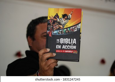 Havana/ Cuba; 06.07.2019: An Evangelical Pastor Shows A Bible During An Evangelical Service In Havana.