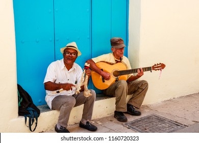 Havana, Cuba - 2018 
Two Local Street Entertainers Playing Cuban Music In Havana, Cuba.