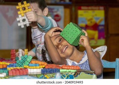 HAVANA, CUBA - Apr 02, 2019: A View Of Smiling Cuban Children In Kindergarten Playing With Baby Cubes At Recess In Havana, Cuba