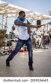 HAVANA, CUBA - Apr 27, 2017: A Vertical Shot Of An African American Male Dancer In The Streets Of Old Havana, Cuba