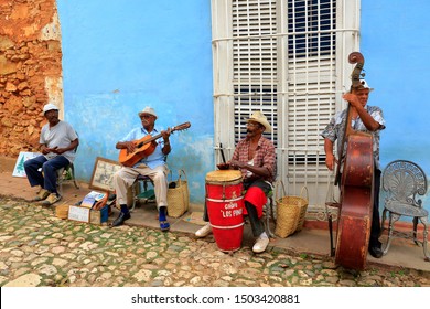 Havana / Cuba - April 2015: Music And Music Albums In Havana And Almost All Cities, Music Groups On The Streets. Tourists Are Happy And Have Fun With Dancing.