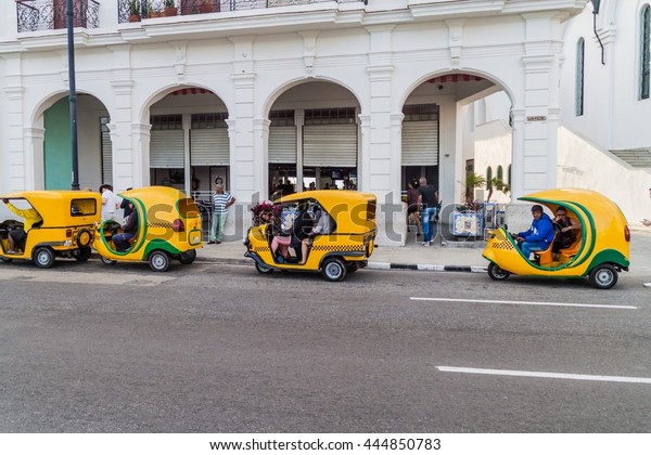 HAVANA, CUBA - FEB 20, 2016: Row of coco taxis in\
the center of Havana.