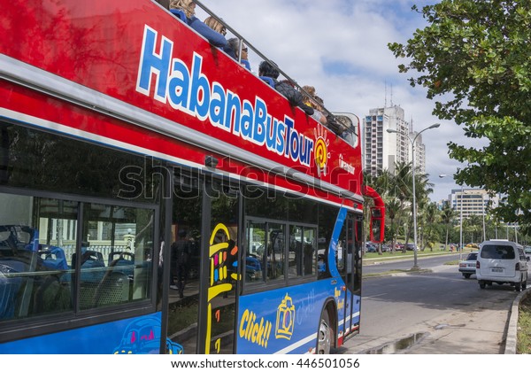 HAVANA, CUBA - JANUARY 20, 2016: Tourist\
bus at a stop of his tour of the city of\
Havana