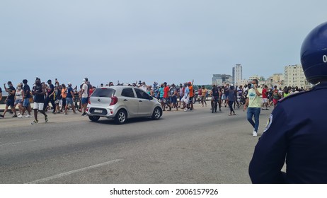 Havana, Cuba - July 11, 2021 : Rare  Protest In Havana, Cubans Crying For Freedom And Revolutionaries Defending President Diaz-Canel