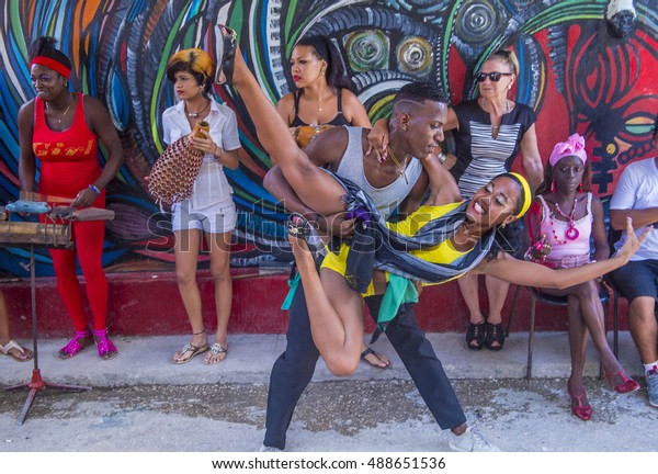 HAVANA, CUBA - JULY 18 : Rumba dancers in Havana\
Cuba on July 18 2016. Rumba is a secular genre of Cuban music\
involving dance, percussion, and song. It originated in the\
northern regions of\
Cuba