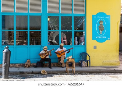 Havana, Cuba - June 27, 2017: Cuban street musicans in the side street in Havana City Cuba  - Serie Cuba Reportage