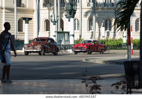 Havana, Cuba - June\
27, 2017: Most american classic cars on the Main Street in Havana\
Cuba- Serie Cuba\
Reportage
