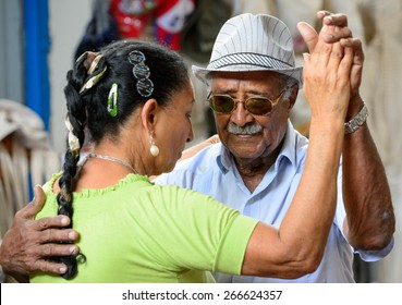 Havana, CUBA - March 20, 2015: An older couple dancing Salsa in the streets of Havana, Cuba