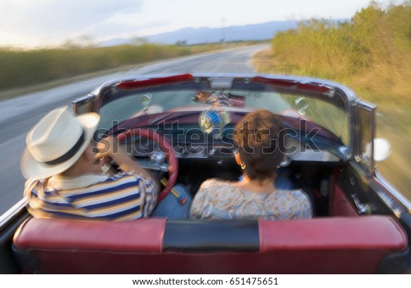 Havana, Cuba - March, 2006: Couple driving a 1950
Chevrolet convertible in
Cuba