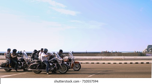 HAVANA, CUBA - May 18, 2017: Unidentified Motorcycle riders are on a trip in Havana, They are waiting for traffic lights.
