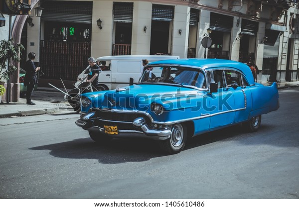 Havana, Cuba - May 22, 2019: Bright Vintage Cuban\
Cars on the Havana\
Streets