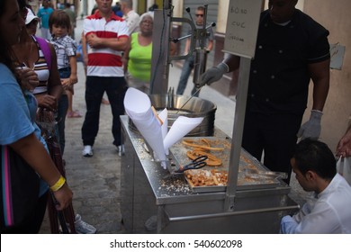 HAVANA, CUBA - NOVEMBER 3, 2012: Cooking Churros, Spanish Dessert, Street Food