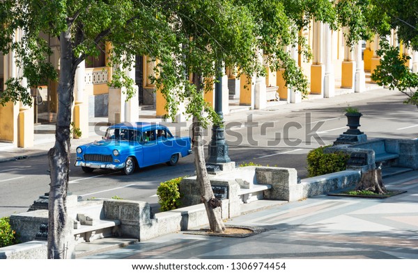 Havana, Cuba - October 03, 2018: American\
blue Chevrolet Bel Air vintage car on the street in the old town\
from Havana City Cuba - Serie Cuba\
Reportage