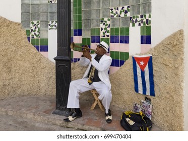 Havana, Cuba - September 14, 2016: Cuban street musician in the old town from Havana City  - Serie Cuba Reportage