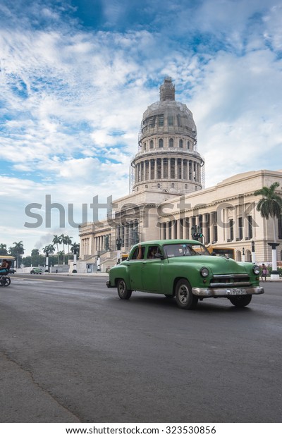 Havana, Cuba - September 22, 2015: 
Classic american car and Capitolio landmark in Havana,Cuba. Havana
is tourist most popular destination in whole Cuba
island.