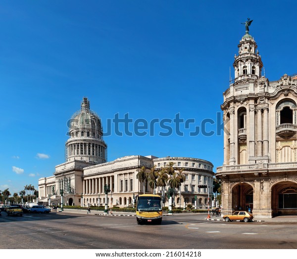 HAVANA, CUBA-MAY 14:Vintage cars near the Capitol on\
May 14,2013 in Havana.These old cars,the only ones that could be\
bought until last year,are a famous sight on the streets of the\
city