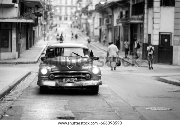 HAVANA, CUBA-OCTOBER 22: Car on streets of\
Havana in October 22, 2015 in Havana. Havana is the largest city in\
the Caribbean