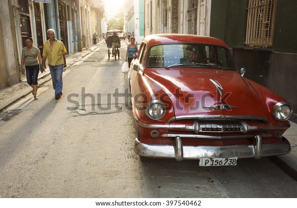 HAVANA, CUBA-OCTOBER 23:Colourful cars\
streets of Havana in October 23, 2015 in Havana. With 2.4 mil.\
inhabitants in the city and 3.7 in its urban area,Havana is the\
largest city in the\
Caribbean\
