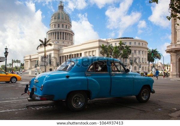 Havana,Cuba - January 22,2017: National Capitol\
Building in Havana, Cuba, was the seat of government in Cuba until\
after the Cuban Revolution in 1959, and is now home to the Cuban\
Academy of\
Sciences.