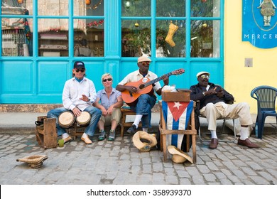 HAVANA,CUBA - JANUARY 5, 2015 : Senior Cuban Men Playing Traditional Music In The Streets Of Old Havana