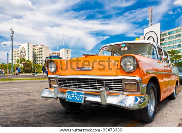 HAVANA-FEBRUARY 16: Classic Chevrolet parked in the\
Revolution Square February 16, 2012 in Havana, Cuba.Before a new\
law issued on October 2011, Cubans could only trade cars that were\
on the road before\
1959