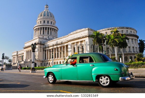 HAVANA-JANUARY 4:Oldtimer near\
the Capitol January 4th, 2013 in Havana.Under the law that changed\
in 2012,Cubans could only buy and sell cars that were in use before\
1959