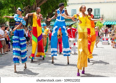 HAVANA-JULY 20:Unidentified street dancers July 20,2012 in Havana.With Cuba receiving over two million tourists a year,artists representing the cuban culture are part of the atmosphere of Old Havana