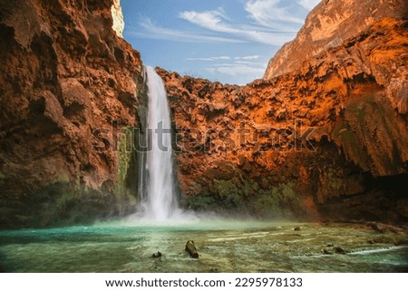 Havasu Falls is a waterfall of Havasu Creek in the Grand Canyon, Arizona, United States. It is within Havasupai tribal lands. Waterfall in nature