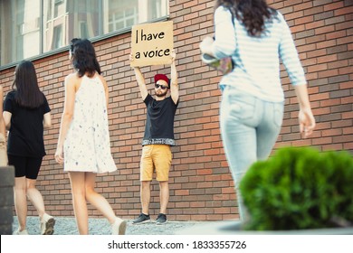 I have a voice. Dude with sign - man stands protesting things that annoy him. Solo demonstration his right to talk free on the street with sign. Opinion heard by public. Social life, politics - Shutterstock ID 1833355726