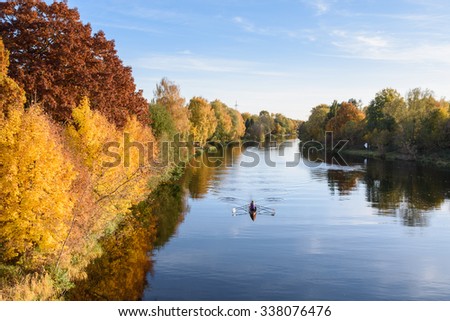 Havel in Brandenburg Germany in autumn with rowers